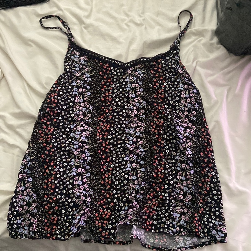 This is a floral shirt very cute can be paired with any jeans :)